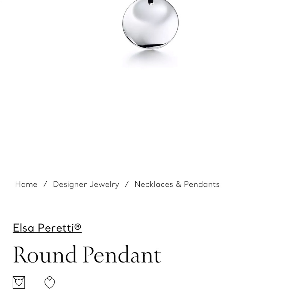 TiffanyandCo.Elsa Peretti 55mm Sterling silver round pendant on black silk cord.